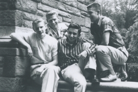 Charles and Bill in 1956 sitting in the Cloisters with Don Potter ’60 popping his head in between them. Observing the trio is Ted Huber ’60, one of the Chit Chatters. 